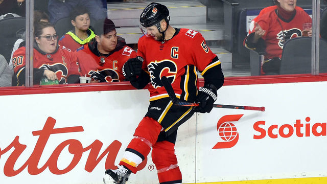 CALGARY, AB - JANUARY 12: Mark Giordano #5 of the Calgary Flames celebrates a goal against the Arizona Coyotes during his 800th NHL game on January 13, 2019 at the Scotiabank Saddledome in Calgary, Alberta, Canada.