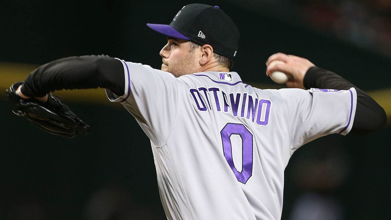 PHOENIX, AZ - JULY 20: Relief pitcher Adam Ottavino #0 of the Colorado Rockies pitches against the Arizona Diamondbacks during the ninth inning of an MLB game at Chase Field on July 20, 2018 in Phoenix, Arizona.