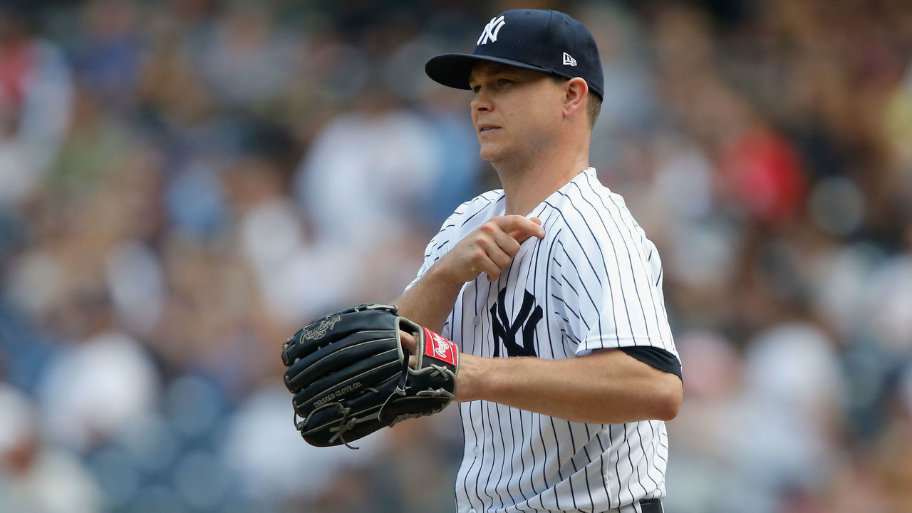 NEW YORK, NY - AUGUST 12: Sonny Gray #55 of the New York Yankees in action against the Texas Rangers at Yankee Stadium on August 12, 2018 in the Bronx borough of New York City. The Yankees defeated the Rangers 7-2.