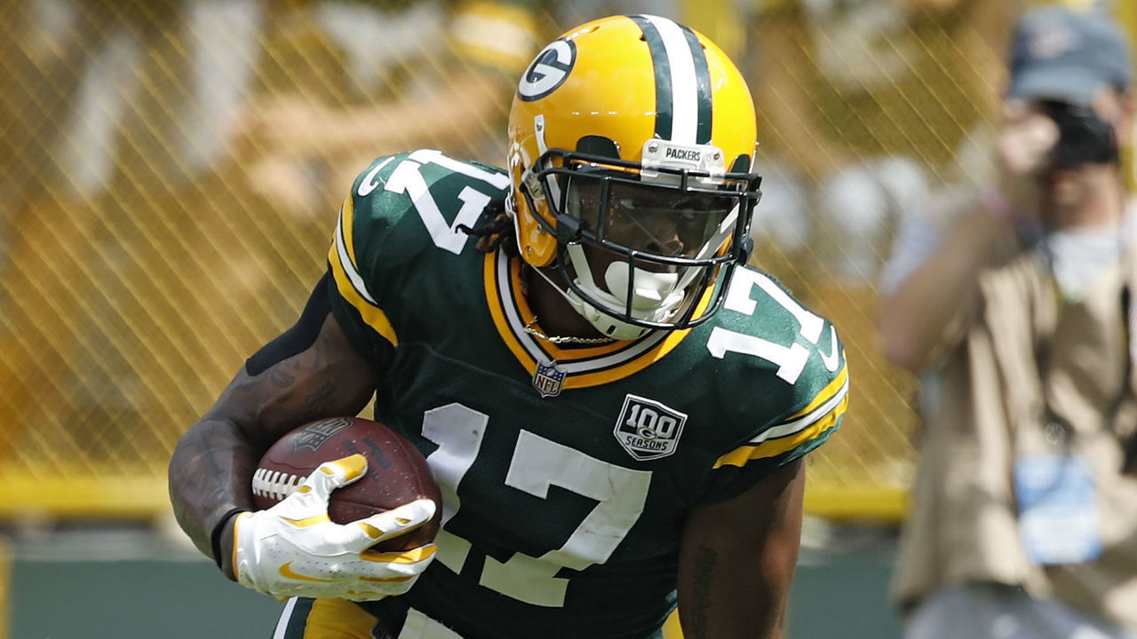 GREEN BAY, WI - SEPTEMBER 16: Davante Adams #17 of the Green Bay Packers runs the ball into the end zone for a touchdown after catching a pass during the game against the Minnesota Vikings at Lambeau Field on September 16, 2018 in Green Bay, Wisconsin. The game ended in a 29-29 tie.