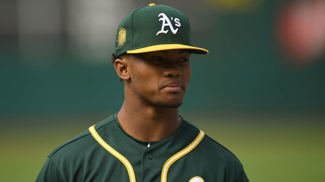 OAKLAND, CA - JUNE 15: The Oakland Athletics number one draft pick Kyler Murray #1 an outfielder out of the University of Oklahoma looks on during batting practice prior to the start of the game between the Los Angeles Angels of Anaheim and Oakland Athletics at the Oakland Alameda Coliseum on June 15, 2018 in Oakland, California.