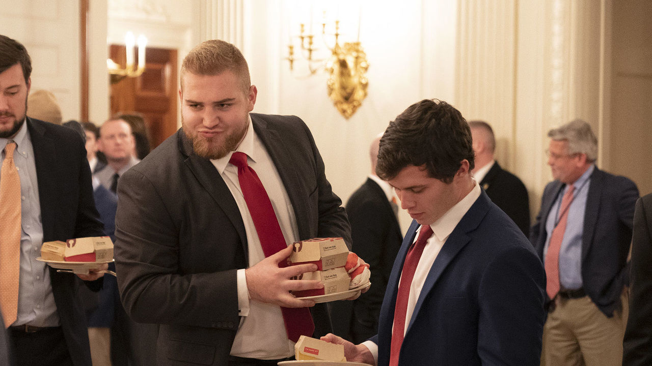 WASHINGTON, DC - JANUARY 14: (AFP OUT) Members of the Clemson Tigers football team prepare to dine on fast food served by President Trump to celebrate their Championship at the White House on January 14, 2019 in Washington, DC.