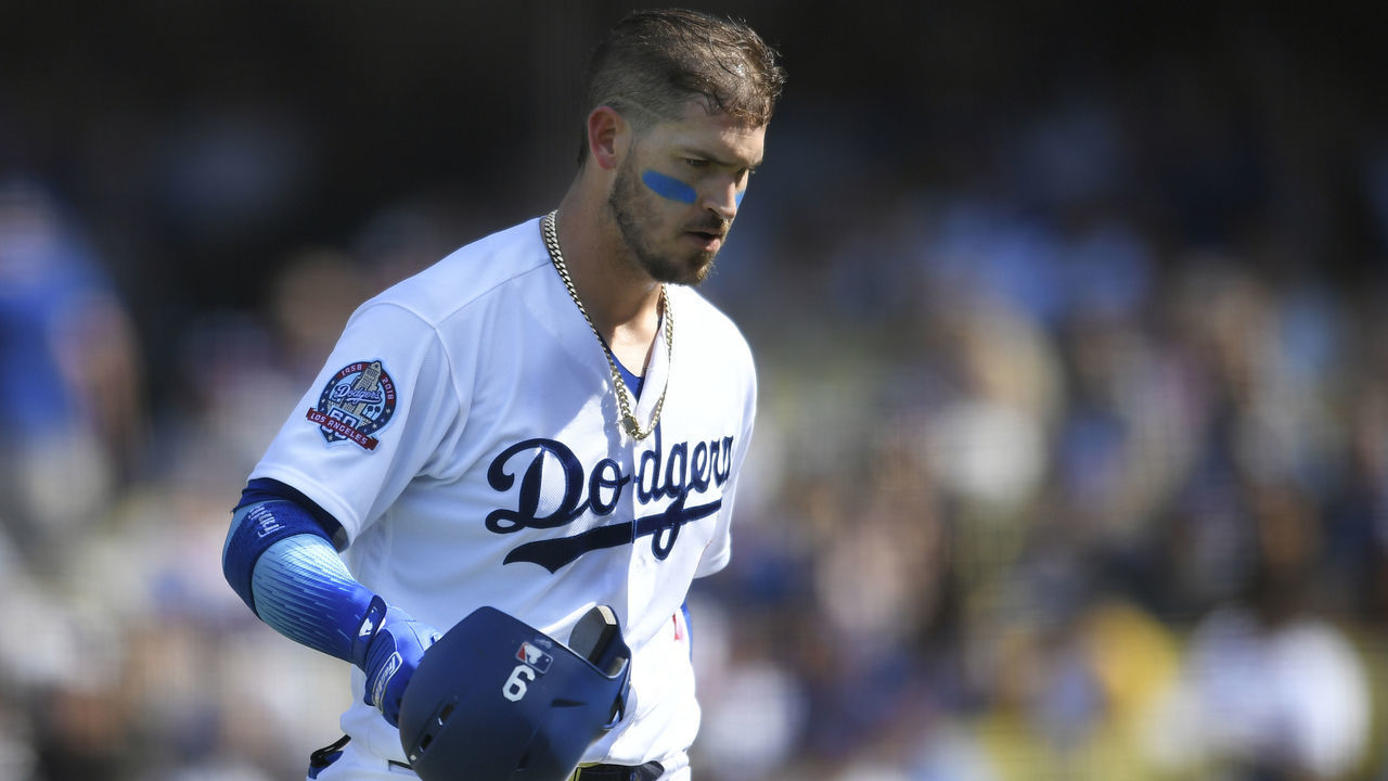 LOS ANGELES, CA - SEPTEMBER 02: Yasmani Grandal #9 of the Los Angeles Dodgers walks back to the dugout in the sixth inning against the Arizona Diamondbacksat Dodger Stadium on September 2, 2018 in Los Angeles, California. Dodgers won 3-2.
