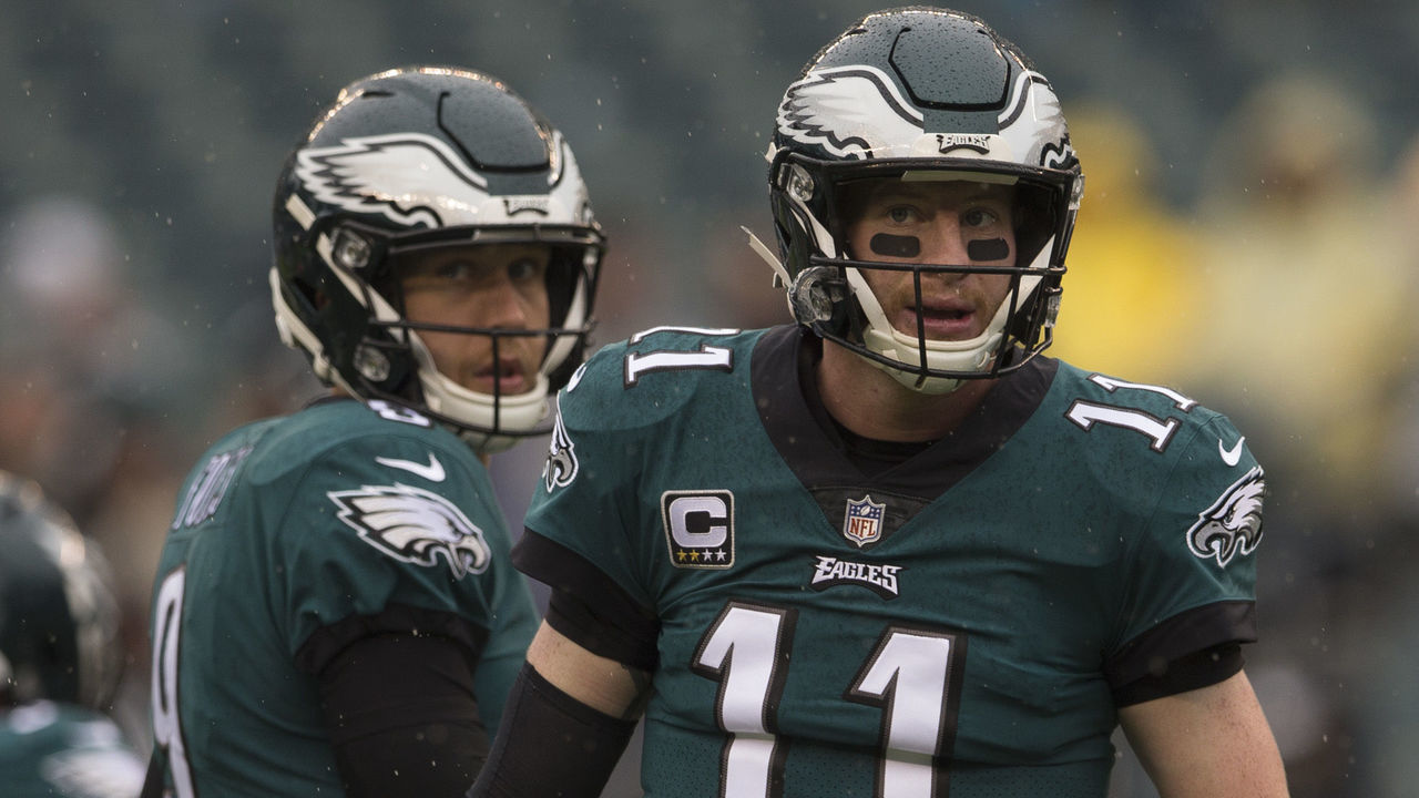 PHILADELPHIA, PA - SEPTEMBER 23: Carson Wentz #11 and Nick Foles #9 of the Philadelphia Eagles warm up prior to the game against the Indianapolis Colts at Lincoln Financial Field on September 23, 2018 in Philadelphia, Pennsylvania.
