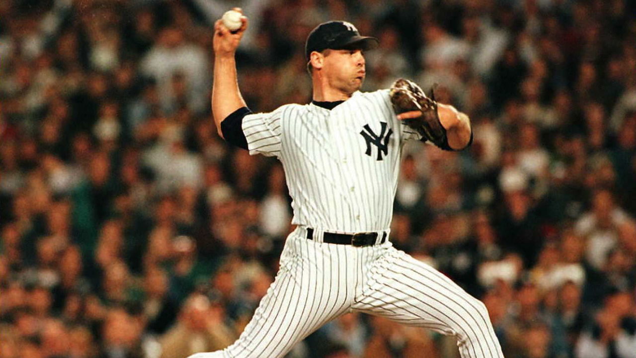 NEW YORK, UNITED STATES: New York Yankees relief pitcher John Wetteland, shown in ninth inning action, was named the Series' Most Valuable Player after the Yankees beat the Atlanta Braves 3-2 to win the World Series at Yankee Stadium in New York 26 October. AFP PHOTO/Henny Ray ABRAMS