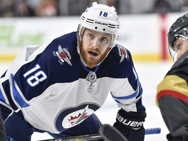 LAS VEGAS, NV - MAY 16: Bryan Little #18 of the Winnipeg Jets awaits a faceoff against the Vegas Golden Knights in Game Three of the Western Conference Final during the 2018 NHL Stanley Cup Playoffs at T-Mobile Arena on May 16, 2018 in Las Vegas, Nevada.