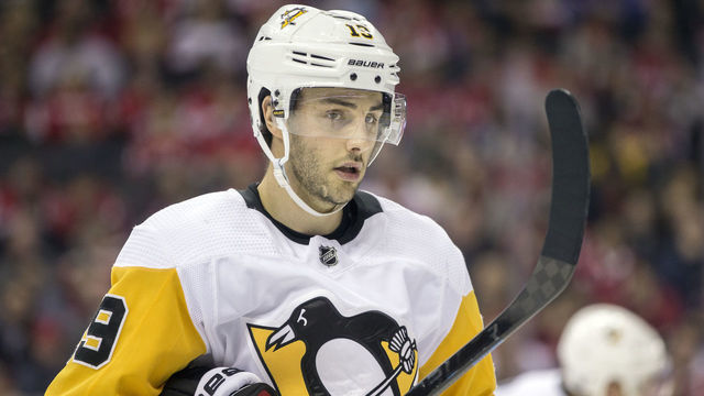 WASHINGTON, DC - DECEMBER 19: Pittsburgh Penguins center Derick Brassard (19) in the face off circle during a NHL game between the Washington Capitals and the Pittsburgh Penguins on December 19, 2018, at Capital One Arena, in Washington, D.C.