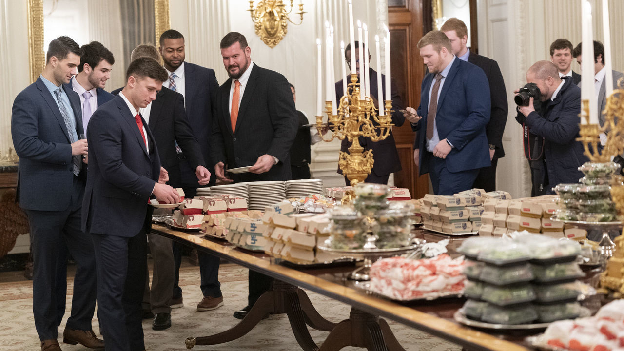 WASHINGTON, DC - JANUARY 14: (AFP OUT) Members of the Clemson Tigers football team prepare to dine on fast food served by President Trump to celebrate their Championship at the White House on January 14, 2019 in Washington, DC.