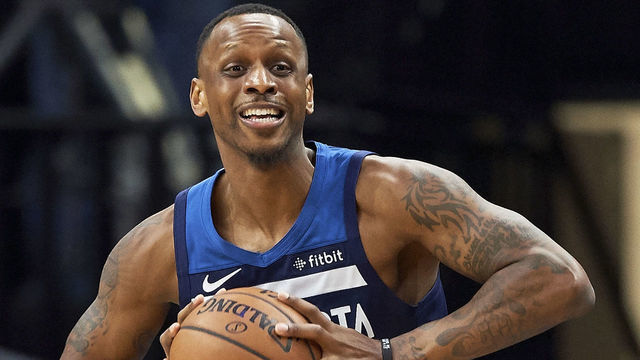 MINNEAPOLIS, MN - NOVEMBER 28: James Nunnally #7 of the Minnesota Timberwolves passes the ball against the San Antonio Spurs during the game on November 28, 2018 at the Target Center in Minneapolis, Minnesota.