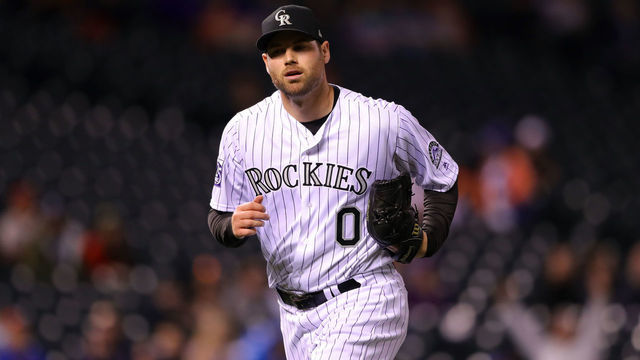 DENVER, CO - JUNE 19: Adam Ottavino #0 of the Colorado Rockies walks back to the dugout during a game against the New York Mets at Coors Field on Tuesday, June 19, 2018 in Denver, Colorado.