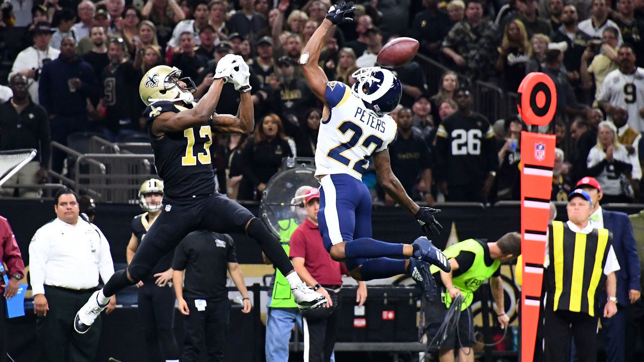 NEW ORLEANS, LA - NOVEMBER 4: Marcus Peters #22 of the Los Angeles Rams breaks up a pass intended for Michael Thomas #13 of the New Orleans Saints at the Mercedes Benz Superdome on November 4, 2018 in New Orleans, Louisiana.