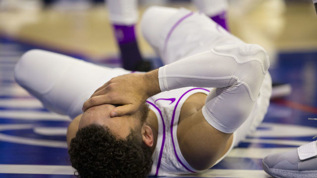 PHILADELPHIA, PA - JANUARY 15: Tyus Jones #1 of the Minnesota Timberwolves lieson the court with an injury in the third quarter against the Philadelphia 76ers at the Wells Fargo Center on January 15, 2019 in Philadelphia, Pennsylvania. The 76ers defeated the Timberwolves 149-107.