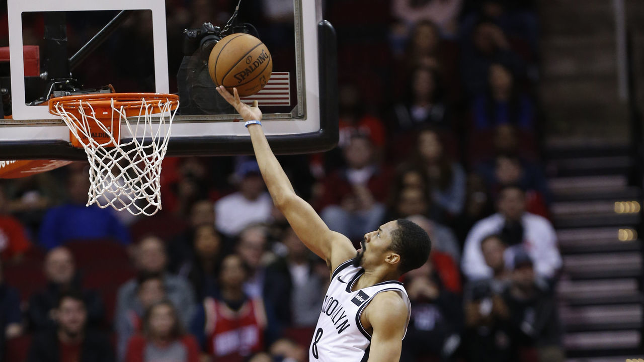HOUSTON, TEXAS - JANUARY 16: Spencer Dinwiddie #8 of the Brooklyn Nets drives past PJ Tucker #17 of the Houston Rockets during the fourth quarter at Toyota Center on January 16, 2019 in Houston, Texas.