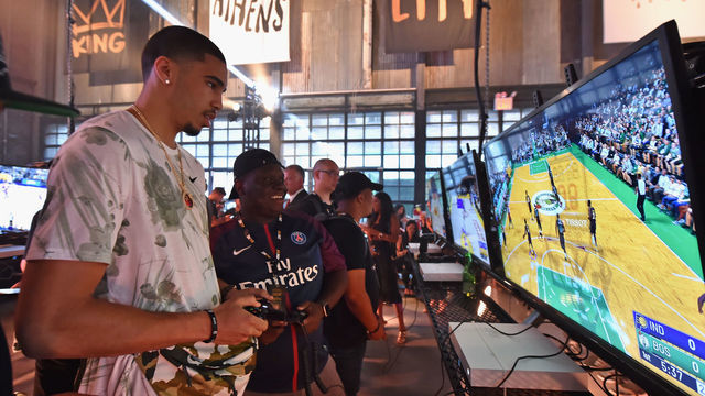 NEW YORK, NY - AUGUST 29: Jayson Tatum plays NBA 2K19 during the NBA 2K19 launch event at Greenpoint Terminal on August 29, 2018 in New York City.