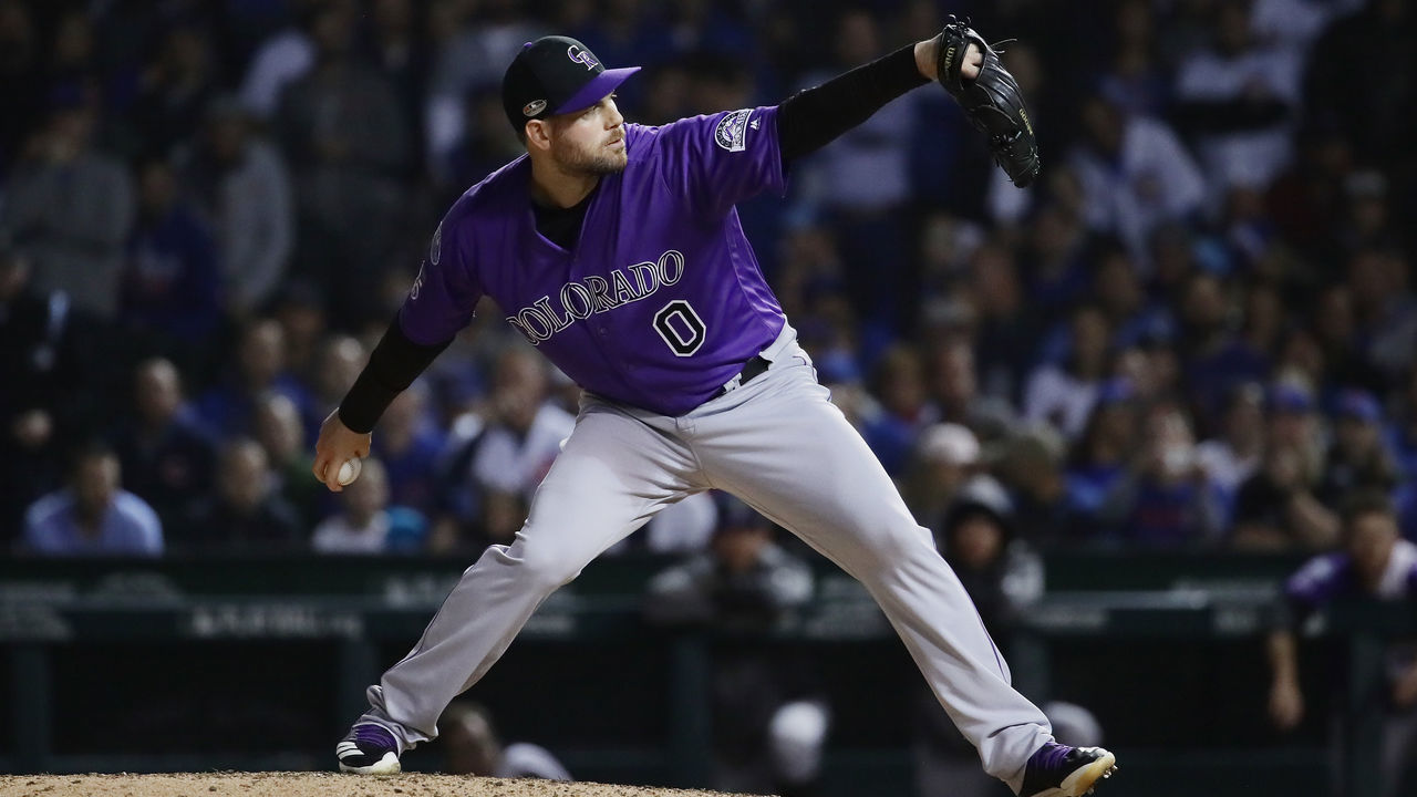 CHICAGO, IL - OCTOBER 02: Adam Ottavino #0 of the Colorado Rockies pitches in the seventh inning against the Chicago Cubs during the National League Wild Card Game at Wrigley Field on October 2, 2018 in Chicago, Illinois.