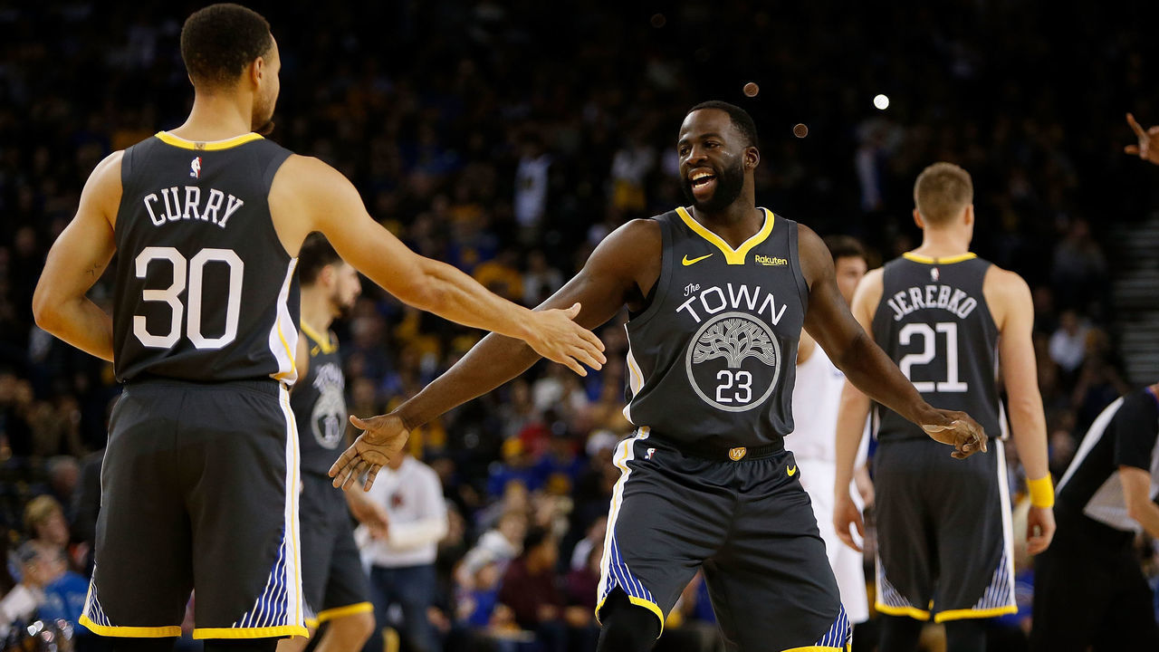 OAKLAND, CA - DECEMBER 23: Stephen Curry #30 and Draymond Green #23 of the Golden State Warriors before the start of the game against the LA Clippers at ORACLE Arena on December 23, 2018 in Oakland, California.