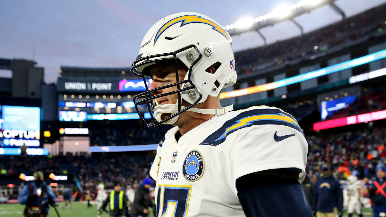 FOXBOROUGH, MASSACHUSETTS - JANUARY 13: Philip Rivers #17 of the Los Angeles Chargers reacts as he walks off the field after the AFC Divisional Playoff Game against the New England Patriots at Gillette Stadium on January 13, 2019 in Foxborough, Massachusetts.