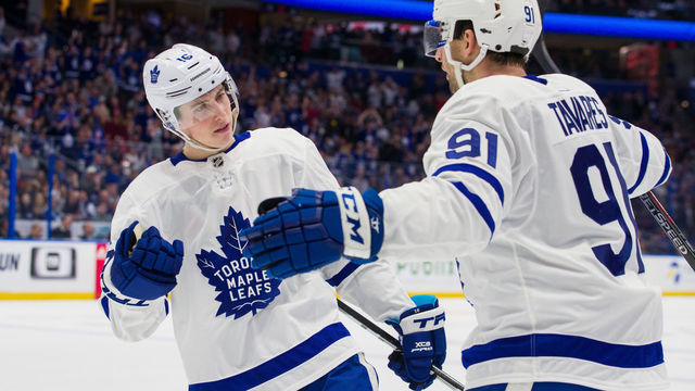 TAMPA, FL - JANUARY 17: Mitchell Marner #16 and John Tavares #91 of the Toronto Maple Leafs celebrate a goal against the Tampa Bay Lightning during the second period at Amalie Arena on January 17, 2019 in Tampa, Florida.