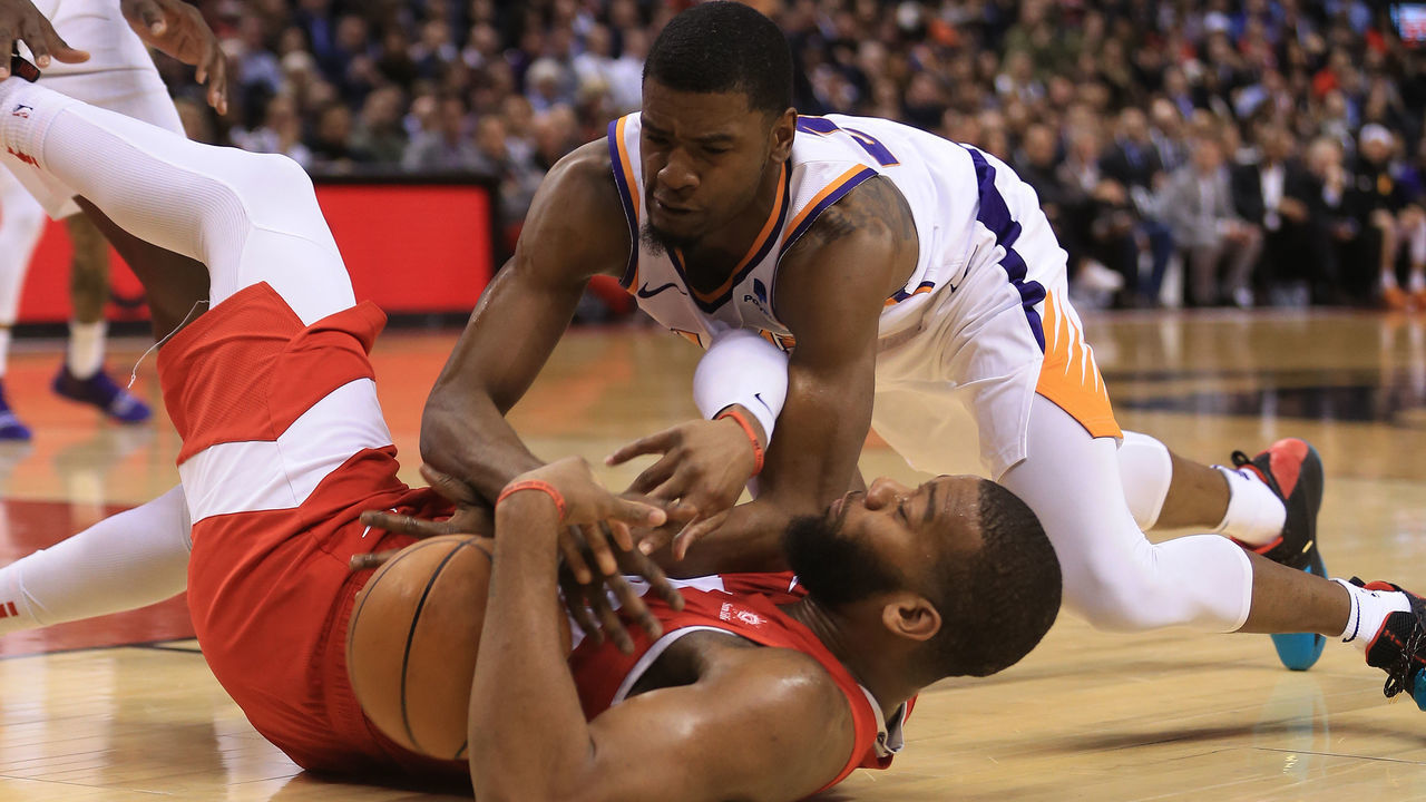 TORONTO, ON- Toronto Raptors Greg Monroe gets tackled by Phoenix Suns Josh Jackson( top right) in NBA action (Rene Johnston Toronto Star) (Rene Johnston/Toronto Star via Getty Images)