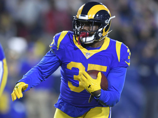 LOS ANGELES, CA - JANUARY 12: Los Angeles Rams running back C.J. Anderson #35 rushes against the Dallas Cowboys at Los Angeles Memorial Coliseum on January 12, 2019 in Los Angeles, California.