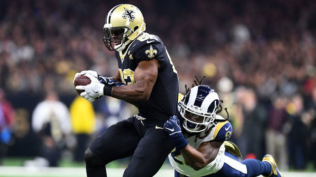 NEW ORLEANS, LA - NOVEMBER 4: Benjamin Watson #82 of the New Orleans Saints is tackled by Mark Barron #26 of the Los Angeles Rams after a catch at the Mercedes Benz Superdome on November 4, 2018 in New Orleans, Louisiana.