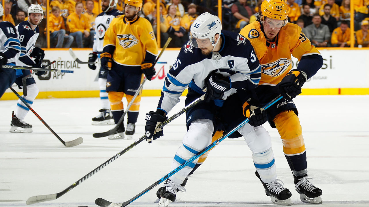 NASHVILLE, TN - APRIL 27: Mark Scheifele #55 of the Winnipeg Jets skates against Ryan Johansen #92 of the Nashville Predators in Game One of the Western Conference Second Round during the 2018 NHL Stanley Cup Playoffs at Bridgestone Arena on April 27, 2018 in Nashville, Tennessee. *** Local Caption *** Mark Scheifele;Ryan Johansen