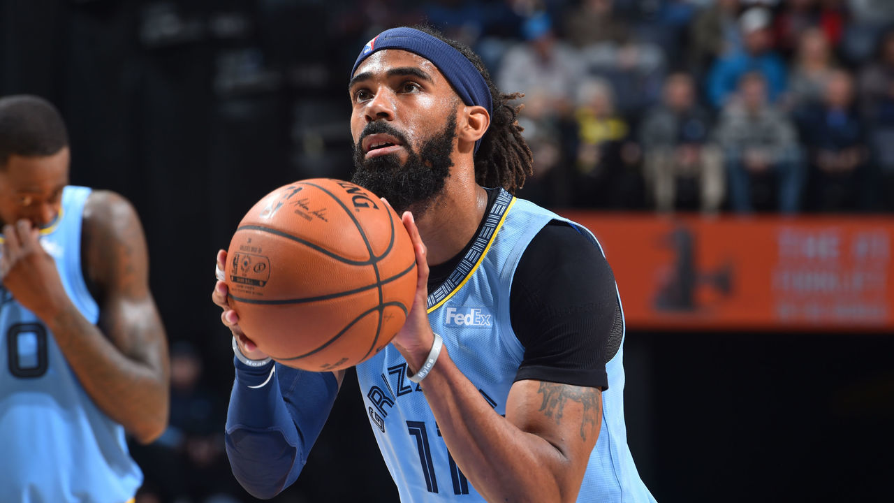 MEMPHIS, TN - JANUARY 16: Mike Conley #11 of the Memphis Grizzlies shoots a free throw against the Milwaukee Bucks on January 16, 2019 at the FedExForum in Memphis, Tennessee. NOTE TO USER: User expressly acknowledges and agrees that, by downloading and/or using this photograph, user is consenting to the terms and conditions of the Getty Images License Agreement. Mandatory Copyright Notice: Copyright 2019 NBAE