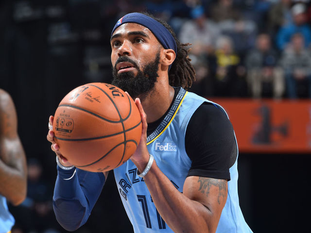 MEMPHIS, TN - JANUARY 16: Mike Conley #11 of the Memphis Grizzlies shoots a free throw against the Milwaukee Bucks on January 16, 2019 at the FedExForum in Memphis, Tennessee. NOTE TO USER: User expressly acknowledges and agrees that, by downloading and/or using this photograph, user is consenting to the terms and conditions of the Getty Images License Agreement. Mandatory Copyright Notice: Copyright 2019 NBAE