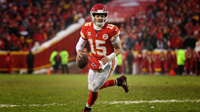 KANSAS CITY, MO - JANUARY 12: Kansas City Chiefs quarterback Patrick Mahomes (15) rolls out during a 4-yard touchdown run with 1:40 left in the second quarter of an AFC Divisional Round playoff game game between the Indianapolis Colts and Kansas City Chiefs on January 12, 2019 at Arrowhead Stadium in Kansas City, MO.