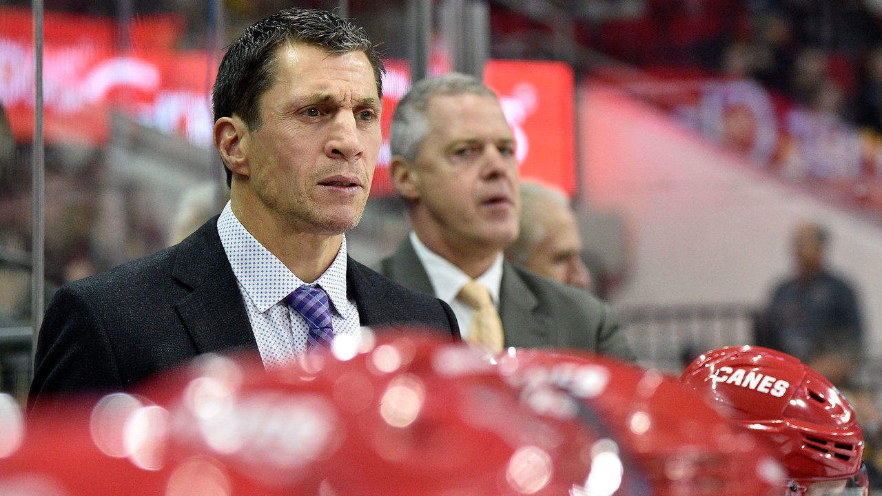 RALEIGH, NORTH CAROLINA - DECEMBER 22: Head coach Rod Brind'Amour of the Carolina Hurricanes watches his team play against the Pittsburgh Penguins during their game at PNC Arena on December 22, 2018 in Raleigh, North Carolina.