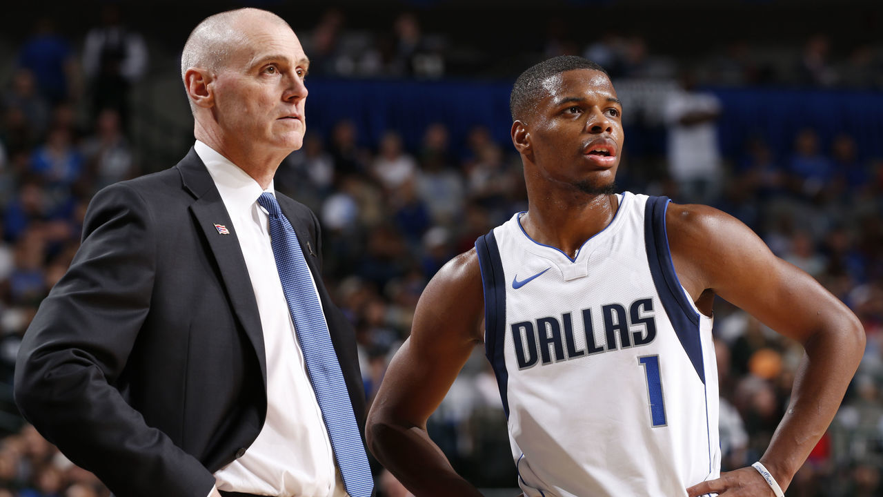 DALLAS, TX - OCTOBER 18: Rick Carlisle and Dennis Smith Jr. #1 of the Dallas Mavericks look on during the game against the Atlanta Hawks at the American Airlines Center in Dallas, Texas on October 18, 2017. NOTE TO USER: User expressly acknowledges and agrees that, by downloading and/or using this photograph, user is consenting to the terms and conditions of the Getty Images License Agreement. Mandatory Copyright Notice: Copyright 2017 NBAE