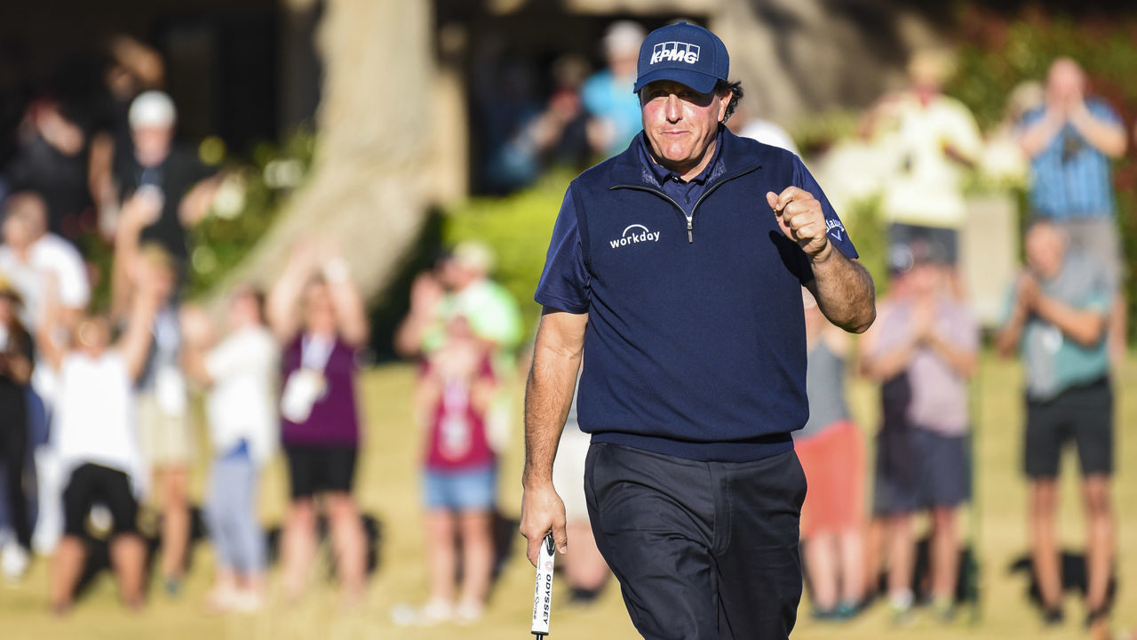 LA QUINTA, CA - JANUARY 19: Phil Mickelson celebrates and smiles after making a birdie putt on the 17th hole green during the third round of the Desert Classic on the Stadium Course at PGA West on January 19, 2019 in La Quinta, California.