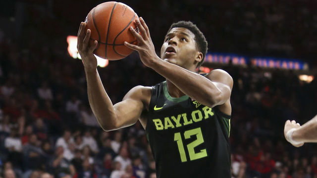 TUCSON, AZ - DECEMBER 15: Baylor Bears guard Jared Butler (12) lays up the ball during the a college basketball game between Baylor Bears and Arizona Wildcats on December 15, 2018, at McKale Center in Tucson, AZ.
