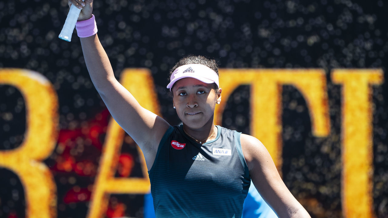 MELBOURNE, AUSTRALIA - JANUARY 21: Naomi Osaka from Japan celebrates beating Anastasija Sevastova of Latvia during day eight of the 2019 Australian Open at Melbourne Park on January 21, 2019 in Melbourne, Australia.
