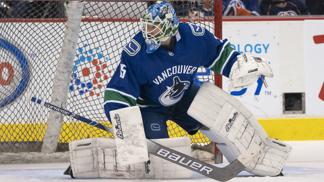 VANCOUVER, BC - JANUARY 16: Thatcher Demko #35 of the Vancouver Canucks makes a save during the pre-game warm up prior to in NHL action against the Edmonton Oilers on January, 16, 2019 at Rogers Arena in Vancouver, British Columbia, Canada.