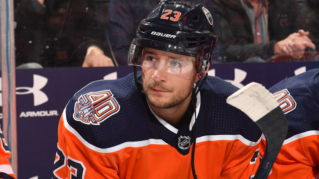 EDMONTON, AB - DECEMBER 22: Ryan Spooner #23 of the Edmonton Oilers sits on the bench prior to the game against the Tampa Bay Lightning on December 22, 2018 at Rogers Place in Edmonton, Alberta, Canada.
