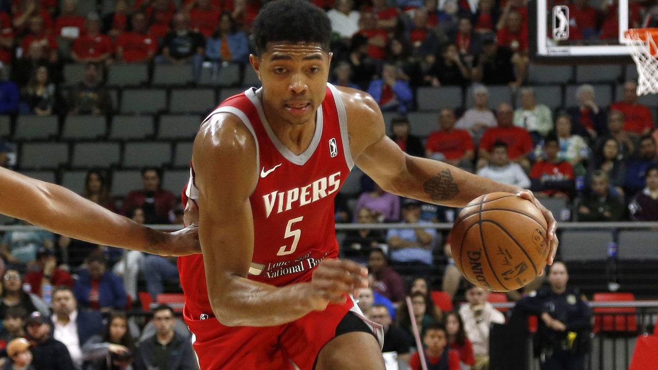 EDINBURG, TX - DECEMBER 27: Bruno Caboclo #5 of the Rio Grande Valley Vipers drives to the net on Xavier Johnson #11 of the Texas Legends during an NBA G-League game at the Bert Ogden Arena December 27, 2018 in Edinburg, Texas. (NOTE TO USER: User expressly acknowledges and agrees that, by downloading and/or using this Photograph, user is consenting to the terms and conditions of the Getty Images License Agreement. Mandatory Copyright Notice: Copyright 2018 NBAE