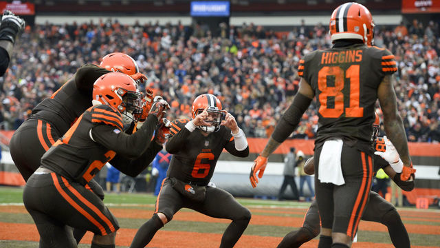 CLEVELAND, OH - DECEMBER 23, 2018: Quarterback Baker Mayfield #6 of the Cleveland Browns celebrates a touchdown pass to wide receiver Rashard Higgins in the third quarter of a game against the Cincinnati Bengals on December 23, 2018 at FirstEnergy Stadium in Cleveland, Ohio. Cleveland won 26-18. (Photo by: 2018 Nick Cammett/Diamond Images/Getty Images)