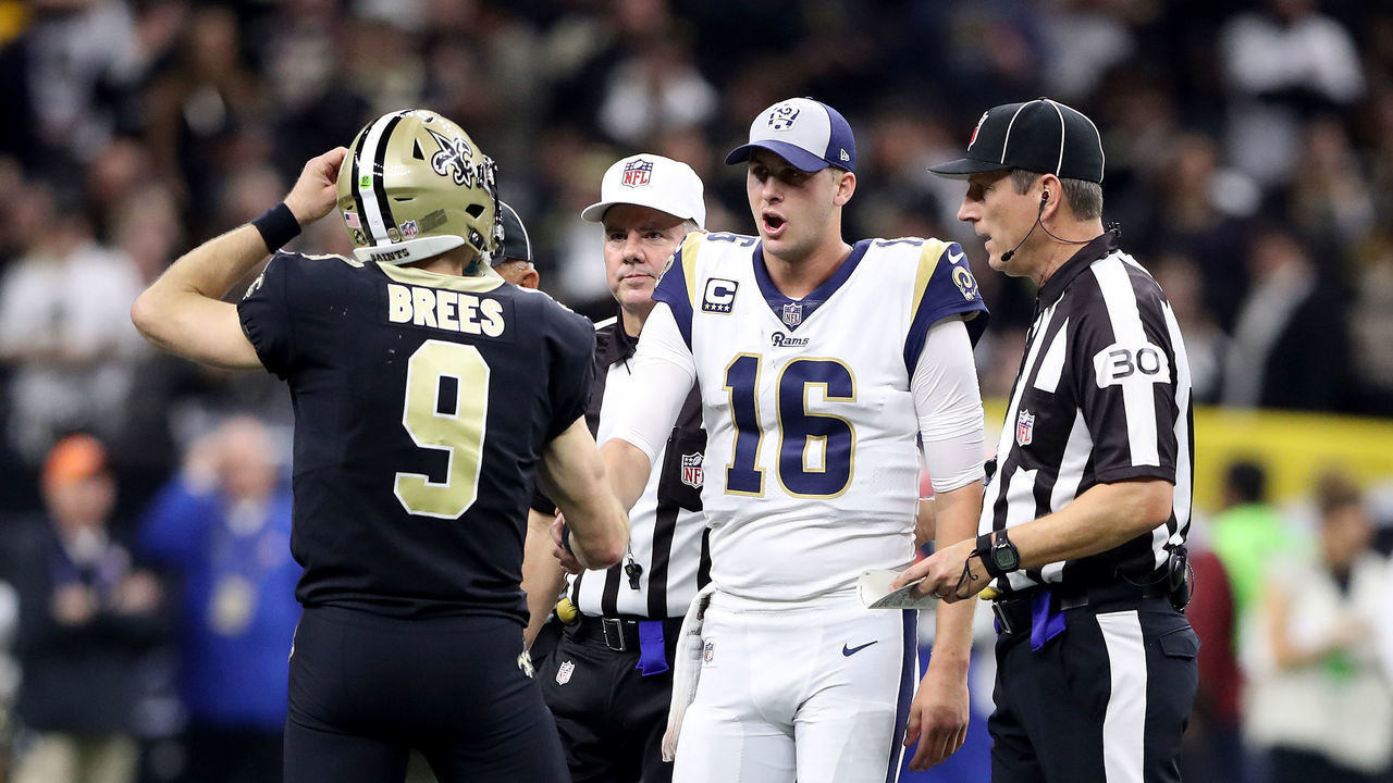 NEW ORLEANS, LOUISIANA - JANUARY 20: Drew Brees #9 of the New Orleans Saints shakes hands with Jared Goff #16 of the Los Angeles Rams at the start of overtime in the NFC Championship game at the Mercedes-Benz Superdome on January 20, 2019 in New Orleans, Louisiana.