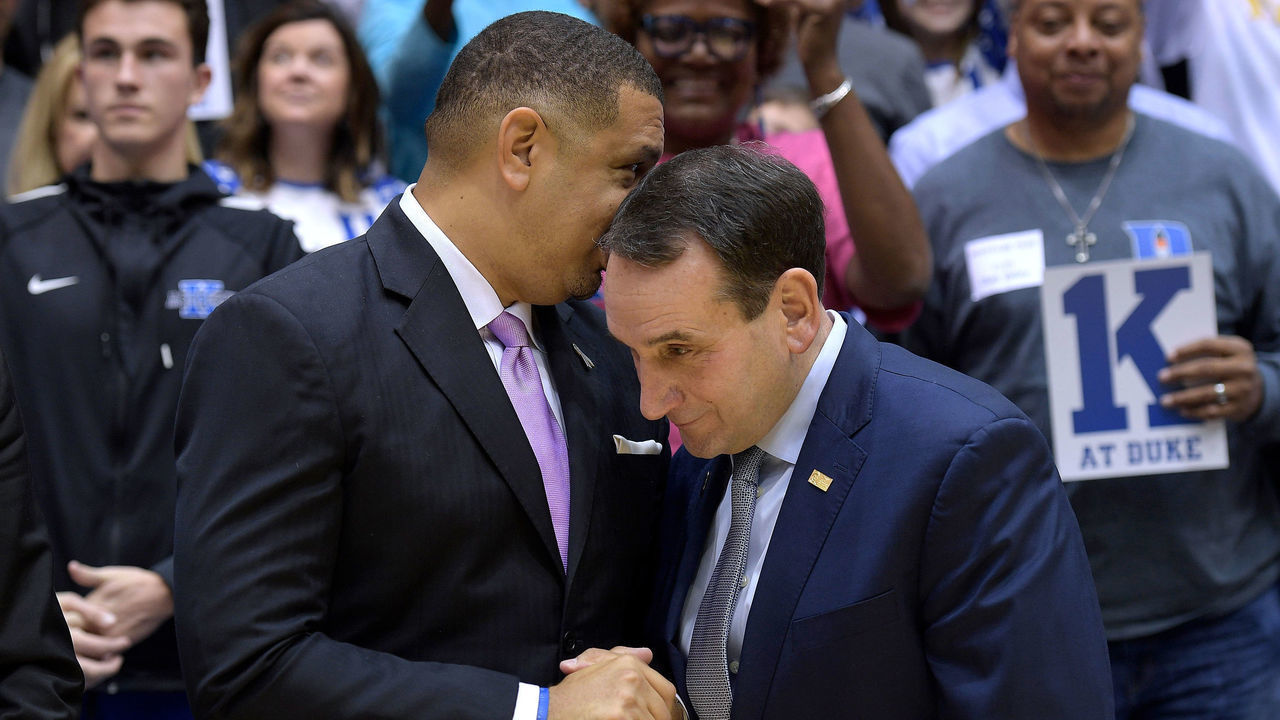 DURHAM, NC - NOVEMBER 11: Associate head coach Jeff Capel (L) talks to head coach Mike Krzyzewski of the Duke Blue Devils following their 99-69 win against the Utah Valley Wolverines at Cameron Indoor Stadium on November 11, 2017 in Durham, North Carolina. The win gives Mike Krzyzewski his 1,000th victory as Duke's head coach and his 1,073rd overall (73 at Army).