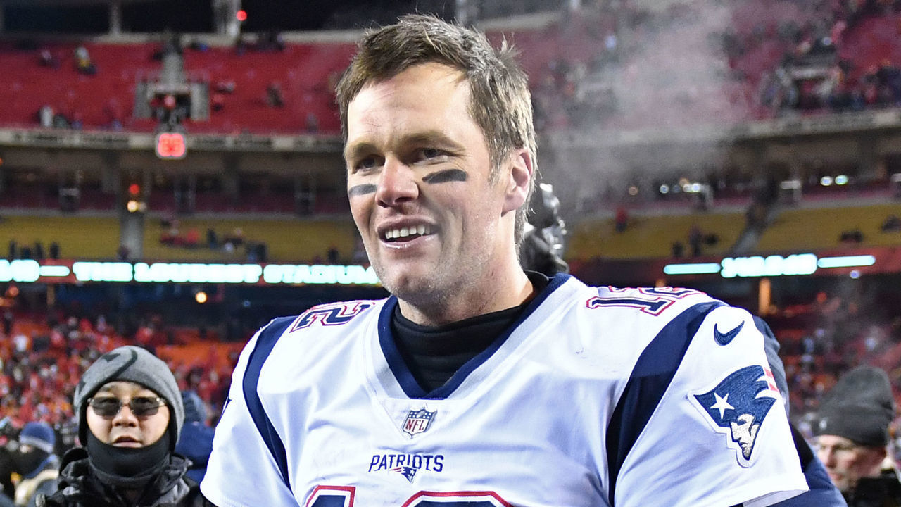 KANSAS CITY, MO - JANUARY 20: Quarterback Tom Brady #12 of the New England Patriots walks off the field after defeating the Kansas City Chiefs in overtime during the AFC Championship Game at Arrowhead Stadium on January 20, 2019 in Kansas City, Missouri.