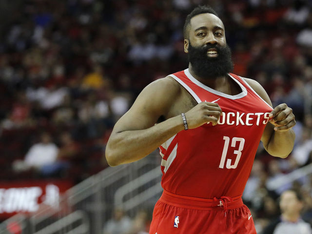 HOUSTON, TX - APRIL 03: James Harden #13 of the Houston Rockets celebrates after a three-point shot in the second half against the Washington Wizards at Toyota Center on April 3, 2018 in Houston, Texas.