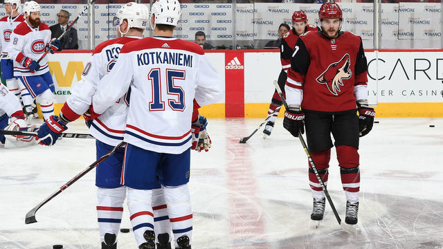 GLENDALE, AZ - DECEMBER 20: Alex Galchenyuk #17 of the Arizona Coyotes skates past Nicolas Deslauriers #20 and Jesperi Kotkaniemi #15 of the Montreal Canadiens prior to a game at Gila River Arena on December 20, 2018 in Glendale, Arizona.