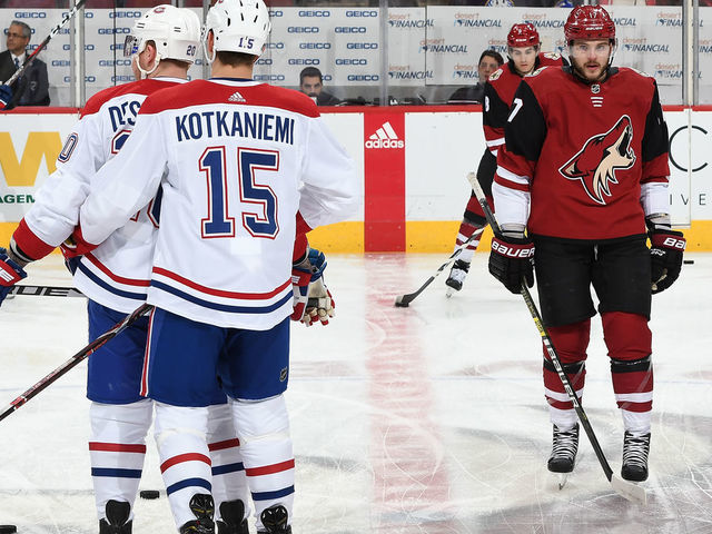 GLENDALE, AZ - DECEMBER 20: Alex Galchenyuk #17 of the Arizona Coyotes skates past Nicolas Deslauriers #20 and Jesperi Kotkaniemi #15 of the Montreal Canadiens prior to a game at Gila River Arena on December 20, 2018 in Glendale, Arizona.
