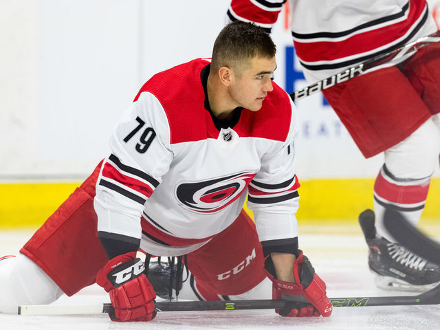 OTTAWA, ON - JANUARY 06: Carolina Hurricanes Right Wing Micheal Ferland (79) stretches during warm-up before National Hockey League action between the Carolina Hurricanes and Ottawa Senators on January 6, 2019, at Canadian Tire Centre in Ottawa, ON, Canada.