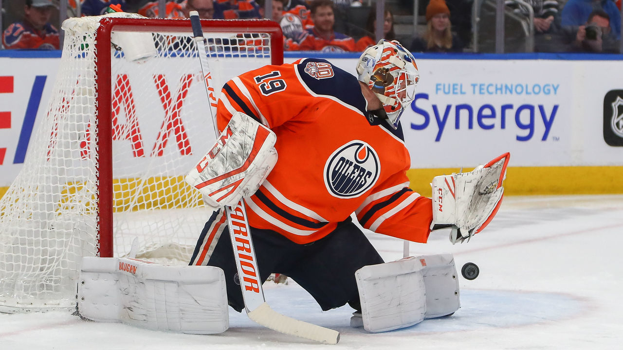 EDMONTON, AB - JANUARY 20: Edmonton Oilers Goalie Mikko Koskinen (19) makes a great save in the second period during the Edmonton Oilers game versus the Carolina Hurricanes on January 20, 2019 at Rogers Place in Edmonton, AB.