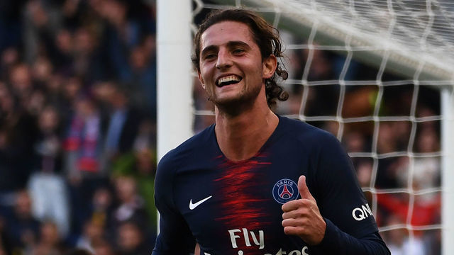 Paris Saint-Germain's French midfielder Adrien Rabiot celebrates after scoring his team's second goal during the French L1 football match between Paris Saint-Germain (PSG) and Amiens at the Parc des Princes stadium in Paris on October 20, 2018.