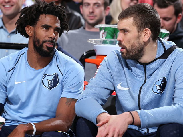 PORTLAND, OR - NOVEMBER 7: Mike Conley #11 of the Memphis Grizzlies and Marc Gasol #33 of the Memphis Grizzlies speak during the game against the Portland Trail Blazers on November 7, 2017 at the Moda Center in Portland, Oregon. Mandatory Copyright Notice: Copyright 2017 NBAE