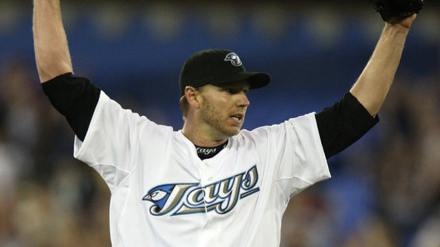 JAYS---08/14/07---Roy Halladay raises his arms for the last out after he pitches a complete game as the Toronto Blue Jays beat the Angels 4-1 at the Roger's Centre in Toronto, August 14, 2007.