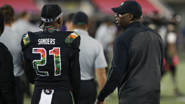 ORLANDO, FL - JANUARY 03: Team Ballaholics head coach Deion Sanders talks to his son Team Ballaholics defensive back Shilo Sanders (21) during the 2019 Under Armour All-America Game between Team Ballaholics and Team Flash on January 03, 2019 at Camping World Stadium in Orlando, FL.